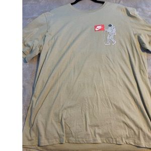 A beige nike shirt